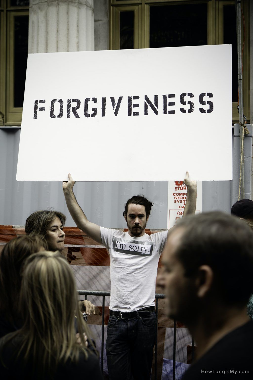 man holds the forgiveness sign